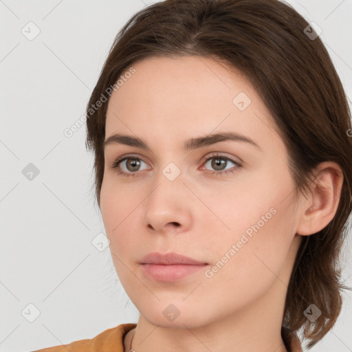 Neutral white young-adult female with medium  brown hair and brown eyes