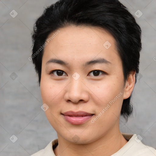 Joyful asian young-adult female with short  brown hair and brown eyes