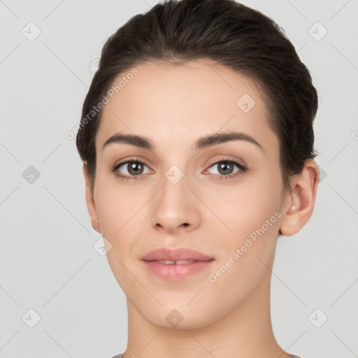 Neutral white young-adult female with short  brown hair and brown eyes