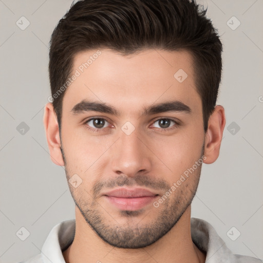 Joyful white young-adult male with short  brown hair and brown eyes