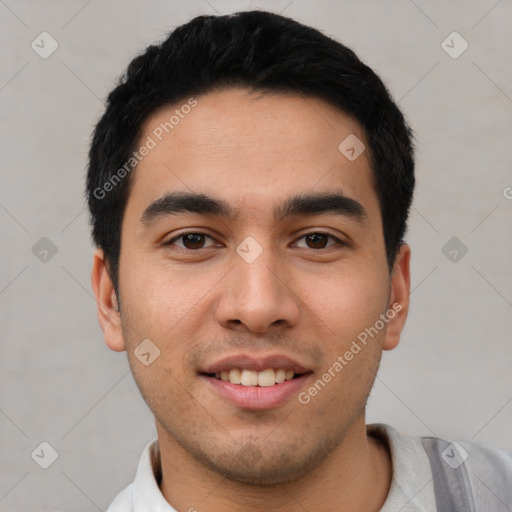 Joyful white young-adult male with short  black hair and brown eyes