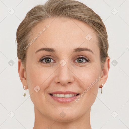 Joyful white young-adult female with short  brown hair and grey eyes