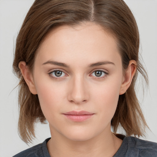 Neutral white young-adult female with medium  brown hair and brown eyes