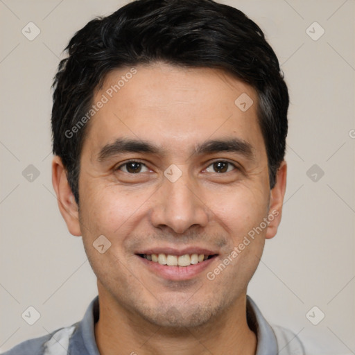 Joyful white young-adult male with short  black hair and brown eyes