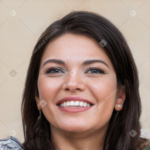 Joyful white young-adult female with long  brown hair and brown eyes