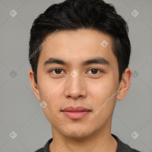 Joyful asian young-adult male with short  black hair and brown eyes