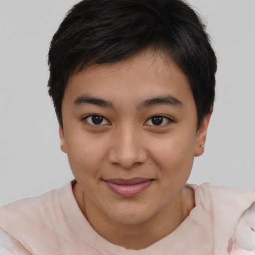 Joyful asian young-adult female with short  brown hair and brown eyes