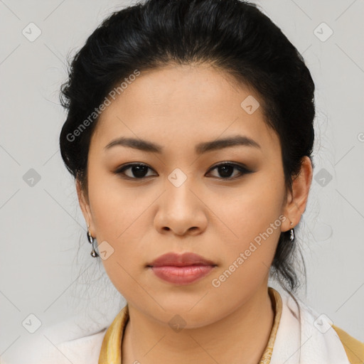 Joyful latino young-adult female with medium  black hair and brown eyes