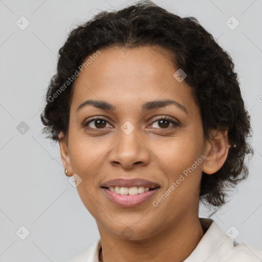 Joyful latino young-adult female with short  brown hair and brown eyes