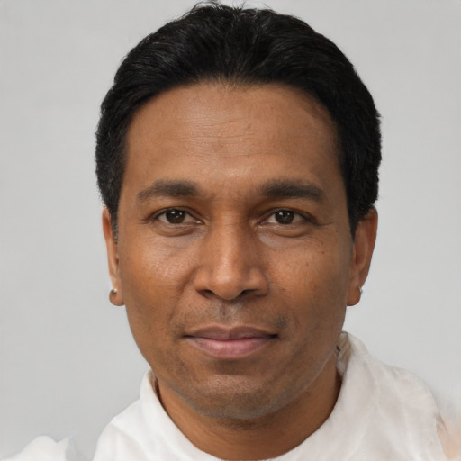 Neutral latino adult male with short  black hair and brown eyes