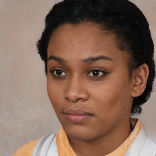 Neutral latino young-adult female with short  black hair and brown eyes
