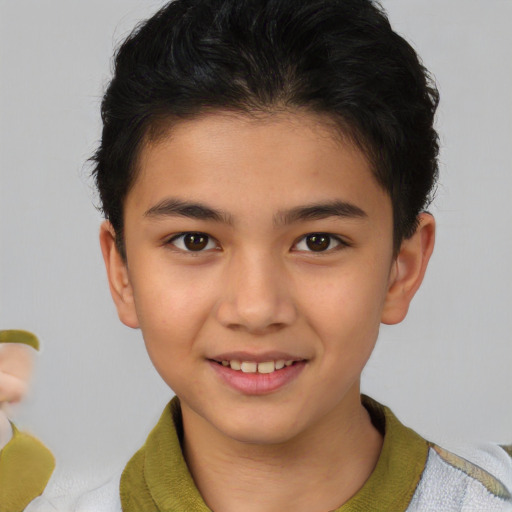 Joyful white child male with short  brown hair and brown eyes