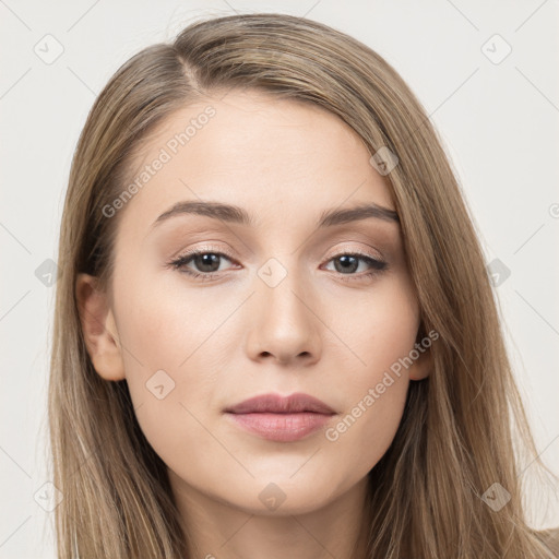 Neutral white young-adult female with long  brown hair and brown eyes