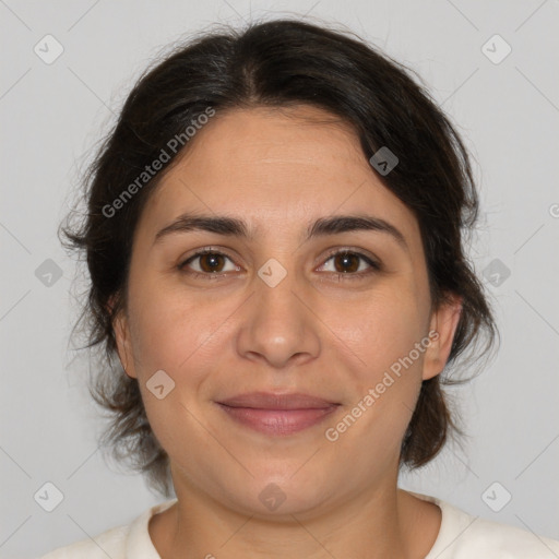 Joyful white adult female with medium  brown hair and brown eyes