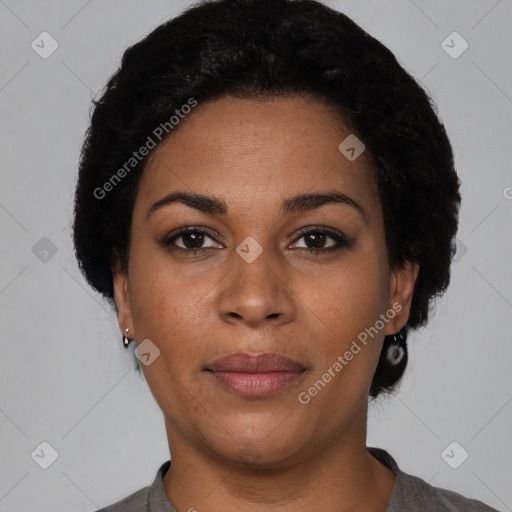 Joyful latino young-adult female with short  black hair and brown eyes