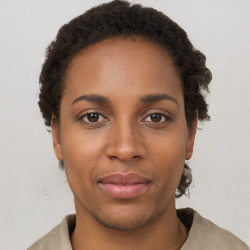 Neutral black young-adult female with short  brown hair and brown eyes