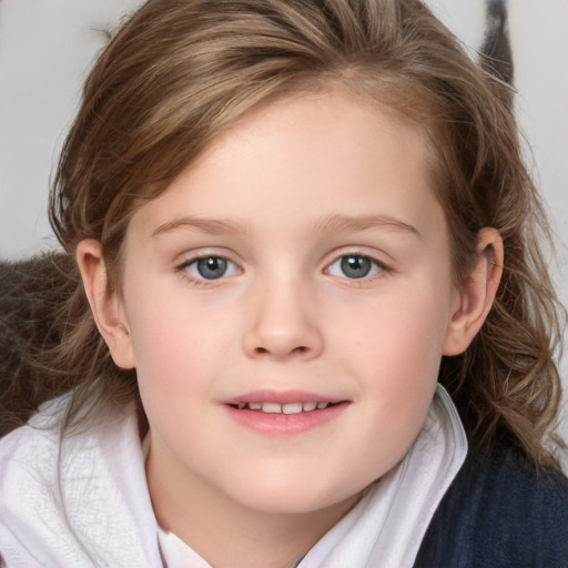 Joyful white child female with medium  brown hair and brown eyes