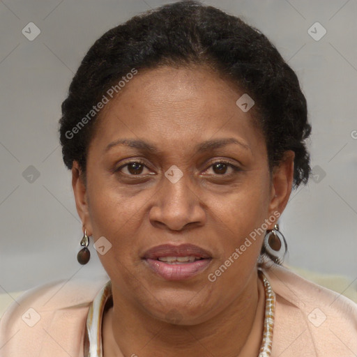 Joyful latino adult female with short  brown hair and brown eyes