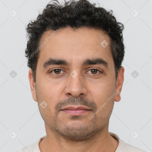 Neutral white young-adult male with short  black hair and brown eyes
