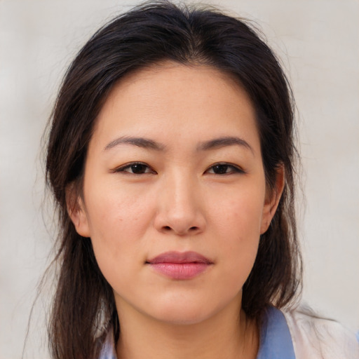 Neutral asian young-adult female with medium  brown hair and brown eyes