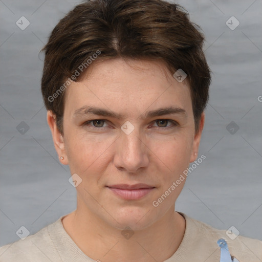 Joyful white young-adult female with short  brown hair and grey eyes