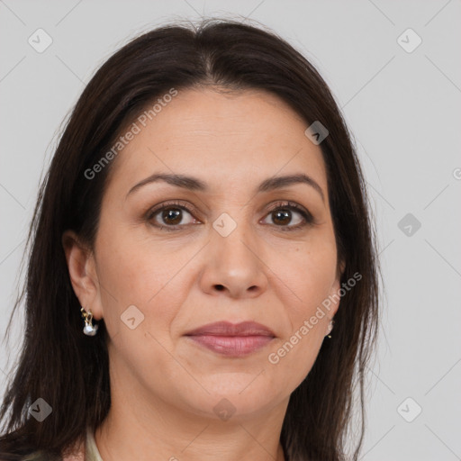 Joyful white adult female with medium  brown hair and brown eyes