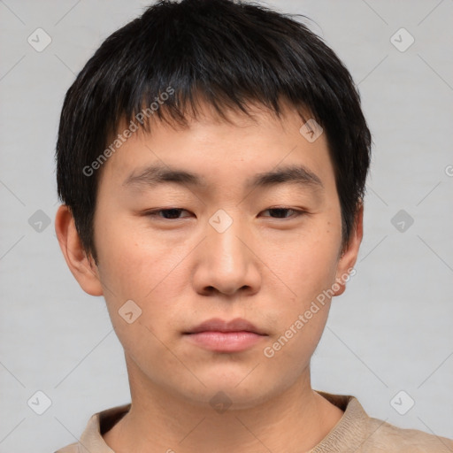 Neutral asian young-adult male with short  brown hair and brown eyes