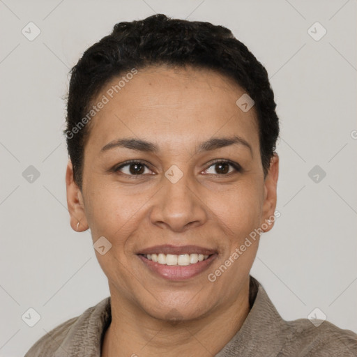 Joyful latino young-adult female with short  black hair and brown eyes