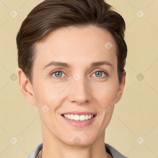 Joyful white young-adult female with short  brown hair and grey eyes