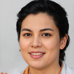 Joyful asian young-adult female with medium  brown hair and brown eyes