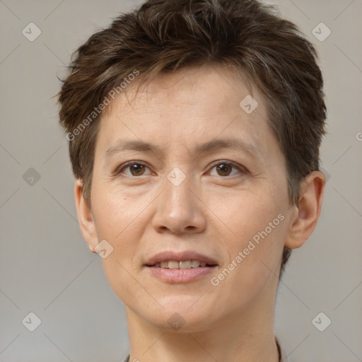 Joyful white adult female with short  brown hair and brown eyes
