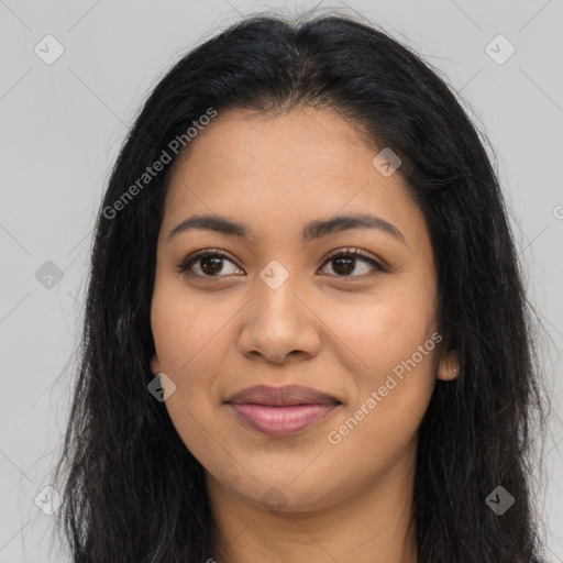 Joyful latino young-adult female with long  brown hair and brown eyes