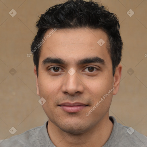 Joyful white young-adult male with short  black hair and brown eyes