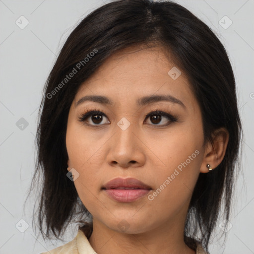 Neutral asian young-adult female with medium  brown hair and brown eyes