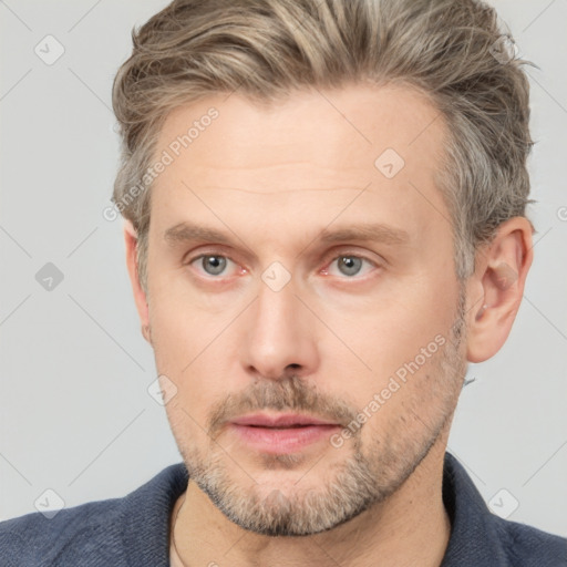 Neutral white adult male with short  brown hair and brown eyes