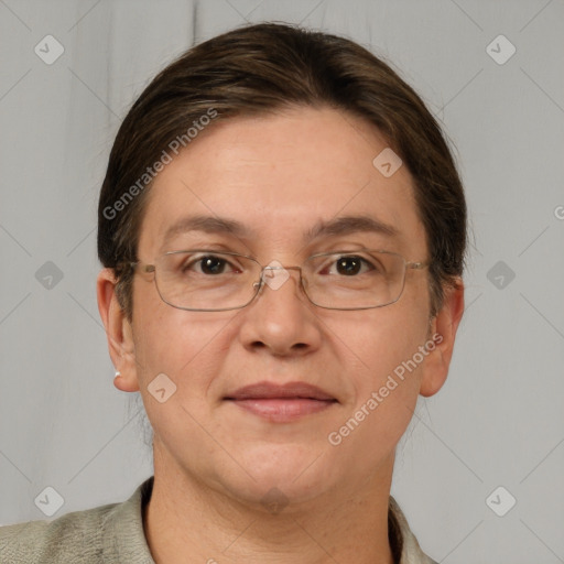 Joyful white adult female with short  brown hair and grey eyes