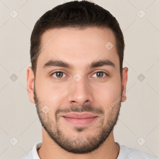 Joyful white young-adult male with short  brown hair and brown eyes