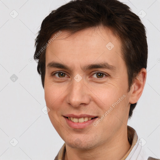 Joyful white young-adult male with short  brown hair and brown eyes