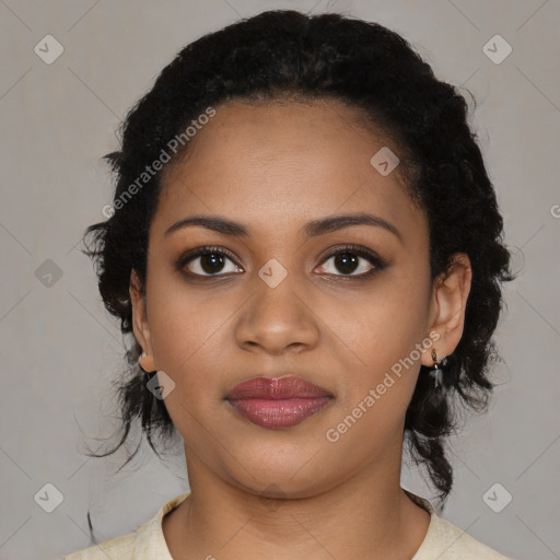 Joyful black young-adult female with medium  black hair and brown eyes