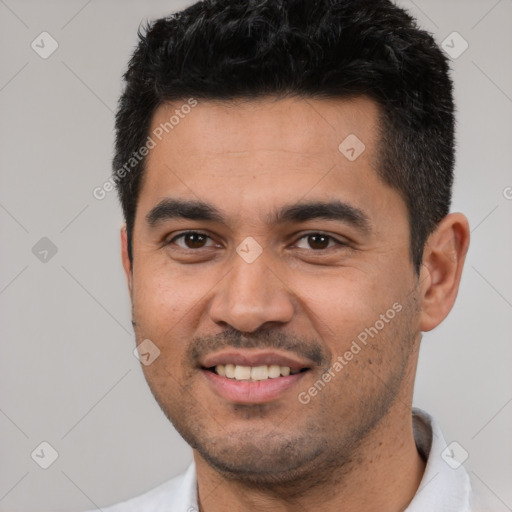 Joyful white young-adult male with short  black hair and brown eyes