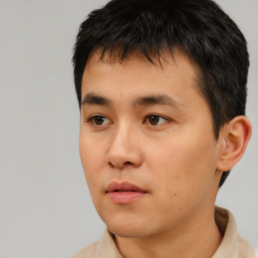 Neutral asian young-adult male with short  black hair and brown eyes