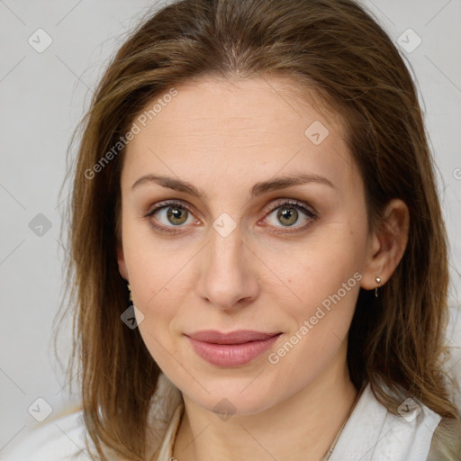 Joyful white young-adult female with medium  brown hair and green eyes