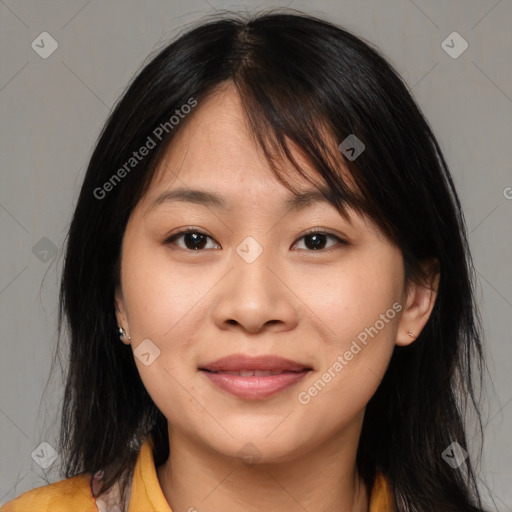 Joyful asian young-adult female with medium  brown hair and brown eyes