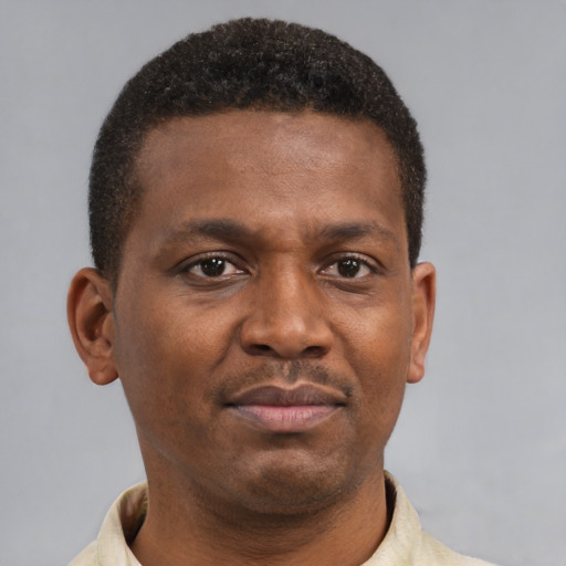 Neutral latino young-adult male with short  brown hair and brown eyes