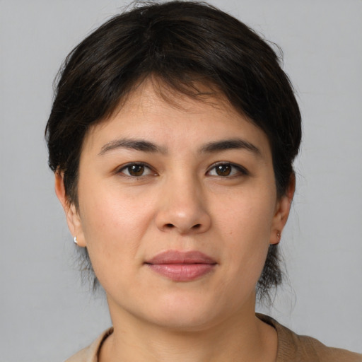 Joyful white young-adult female with medium  brown hair and brown eyes