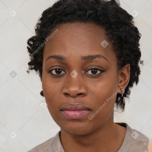 Neutral black young-adult female with short  brown hair and brown eyes