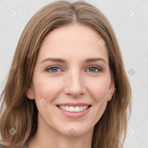 Joyful white young-adult female with long  brown hair and grey eyes