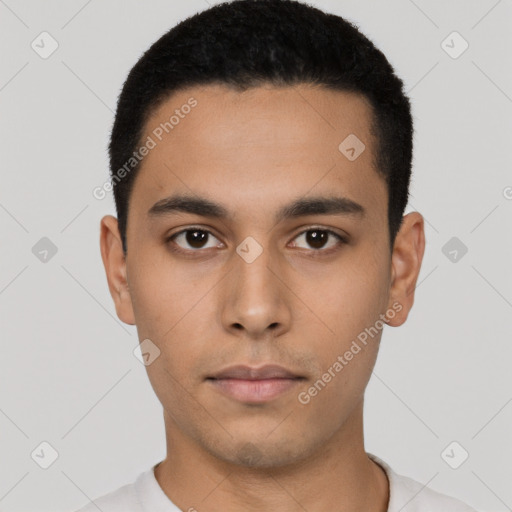 Neutral latino young-adult male with short  black hair and brown eyes