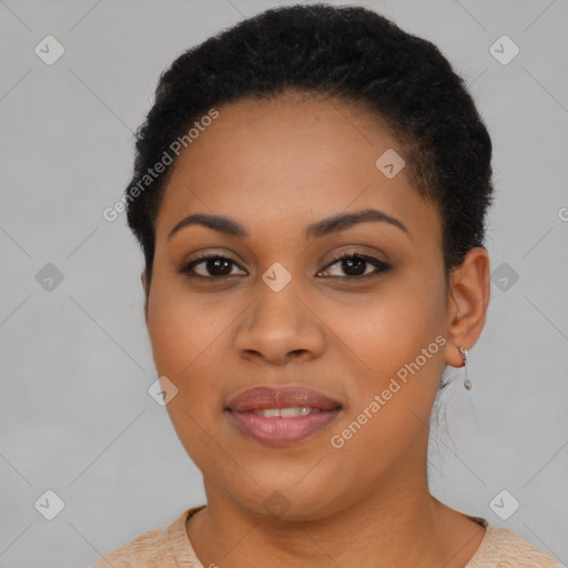 Joyful black young-adult female with short  brown hair and brown eyes