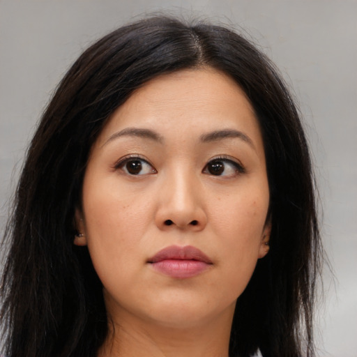 Neutral asian young-adult female with long  brown hair and brown eyes